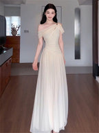 Elara Ivory Draped One Shoulder Maxi Dress