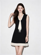 Black V Neck Bow Tie Sleeveless Pleated Hem Mini Dress