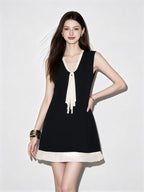 Black V Neck Bow Tie Sleeveless Pleated Hem Mini Dress